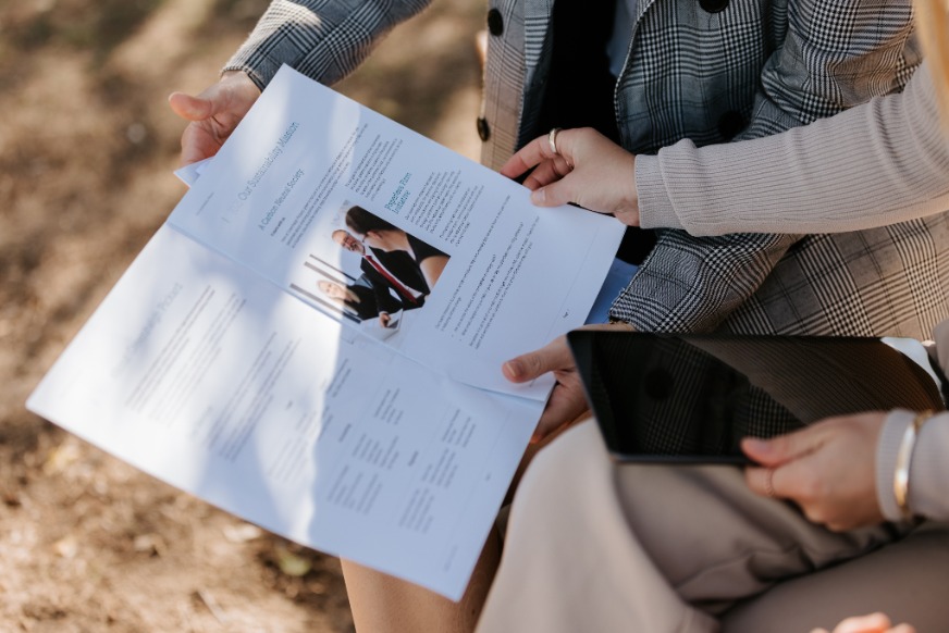 close up of hands on contract