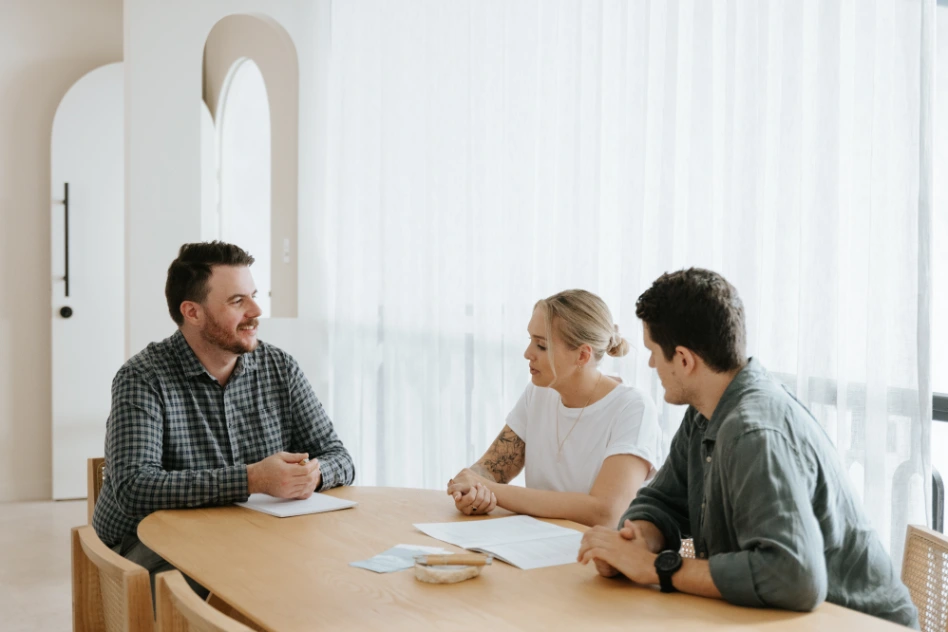 Professionals talking at large table