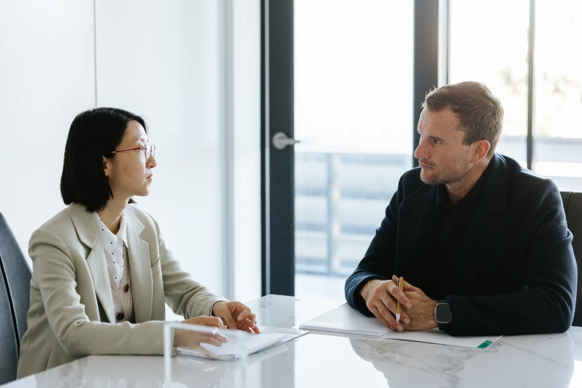 Legal expert discussing estate dispute with client