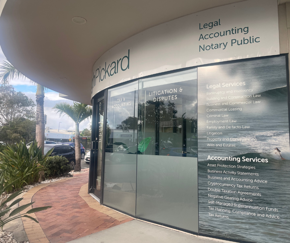 Office building in coolum with services on sign printed as: legal, accounting and notary public