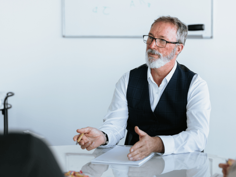 male lawyer with beard explaining legal information